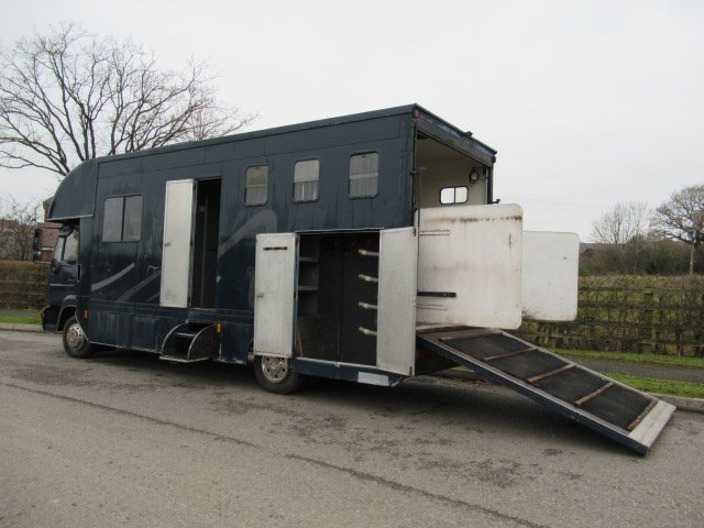 15-589-2003 MAN 8163 7.5 Ton Coach built by AAquine coach builders. Stalled for 3 with smart living.. Sleeping for 4.